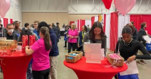 People attending a career fair with tips for preparing for a job fair
