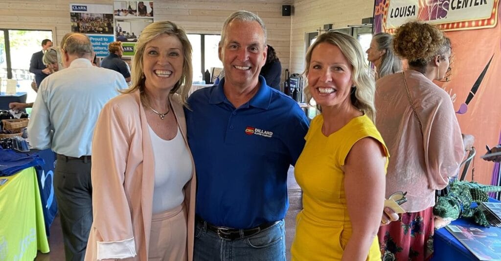Kelly, employer and Ginni at a job fair