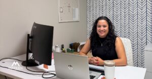 Maria, the Matern Staffing summer intern, sitting at her desk