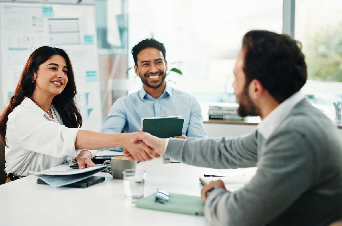 Businessman, woman or colleagues shaking hands with smile or team for hiring, recruiting