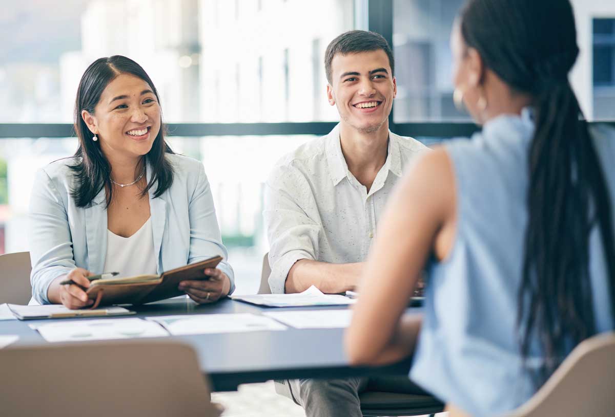 Meeting, recruitment or managers in job interview with businesswoman talking or listening in negotiation Meeting, recruitment or managers in job interview with businesswoman talking or listening in negotiation