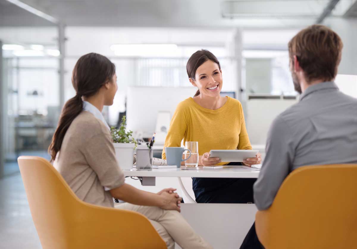 Business woman, interview and meeting with tablet for recruiting or hiring at office desk. Business woman, interview and meeting with tablet for recruiting or hiring at office desk.
